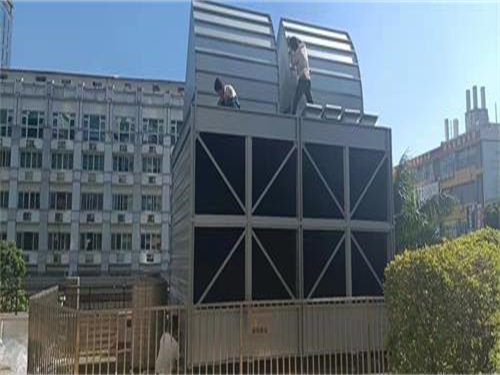雙直線冷卻塔涌現泡溢流景象的緣由(冷卻塔接水盤溢